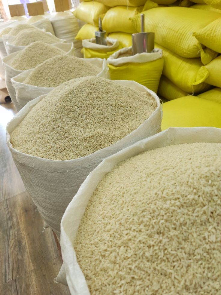 A variety of fresh vegetables including tomatoes and broccoli in a basket